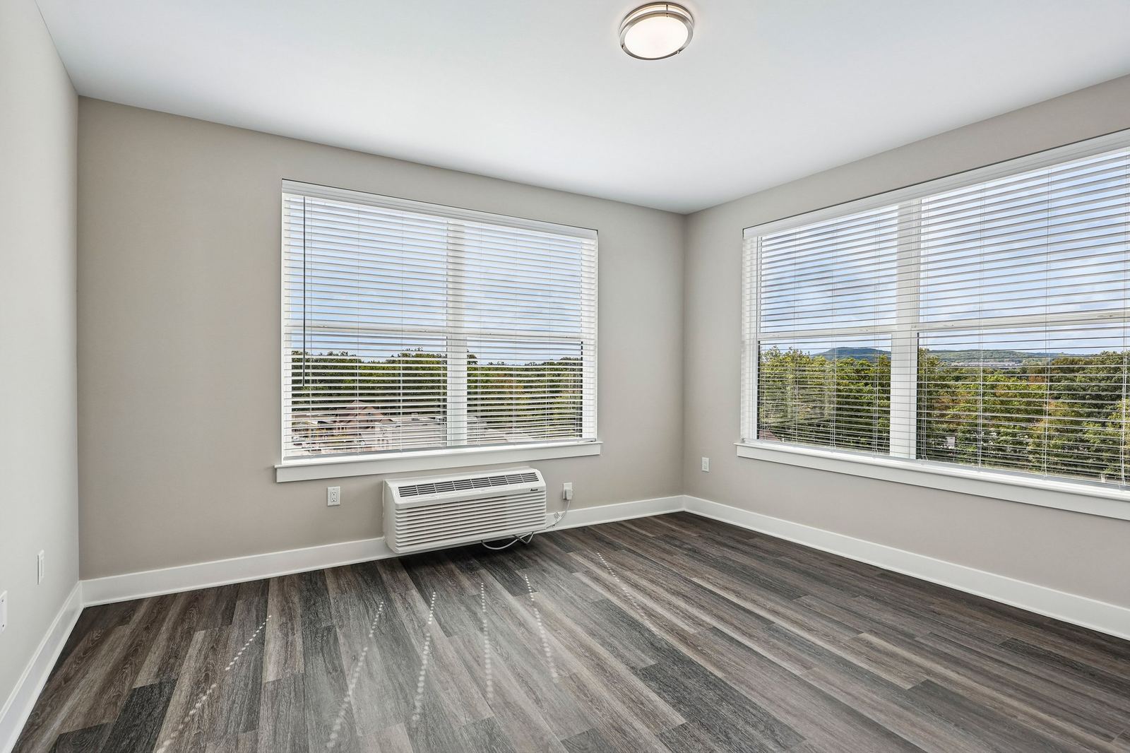 Meridia Pompton Lakes apartment bedroom with bright natural light