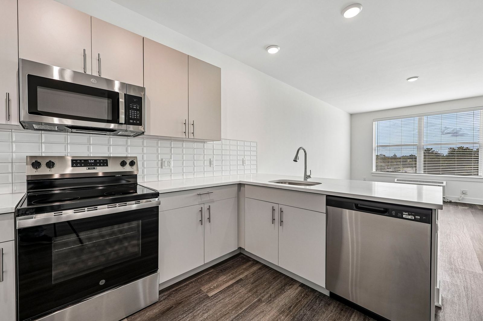 Meridia Pompton Lakes apartment white kitchen with window