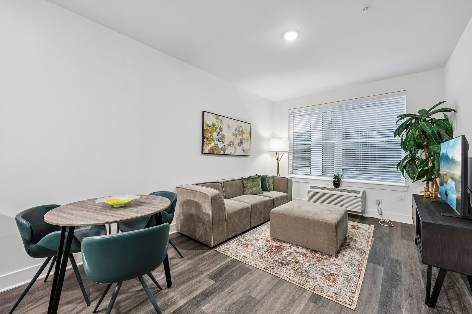 Meridia Pompton Lakes apartment living and dining room, fully furnished with open-concept layout