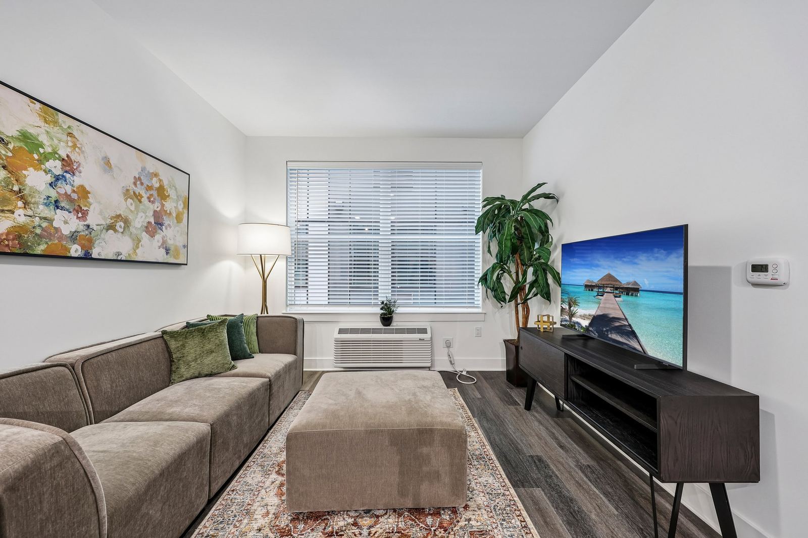 Meridia Pompton Lakes apartment living room seating area with television